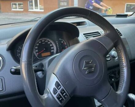 Красный Сузуки Свифт, объемом двигателя 1.49 л и пробегом 200 тыс. км за 6500 $, фото 6 на Automoto.ua