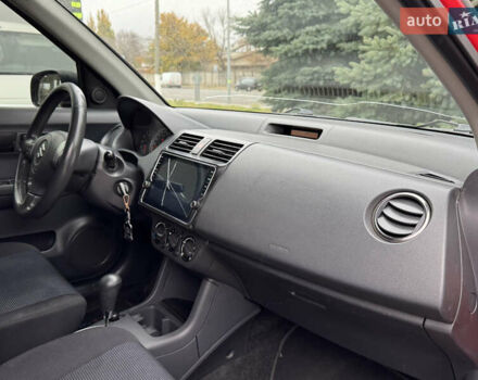 Красный Сузуки Свифт, объемом двигателя 1.49 л и пробегом 160 тыс. км за 5300 $, фото 38 на Automoto.ua