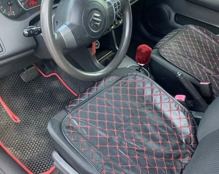 Червоний Сузукі Свифт, об'ємом двигуна 1.3 л та пробігом 184 тис. км за 4800 $, фото 5 на Automoto.ua