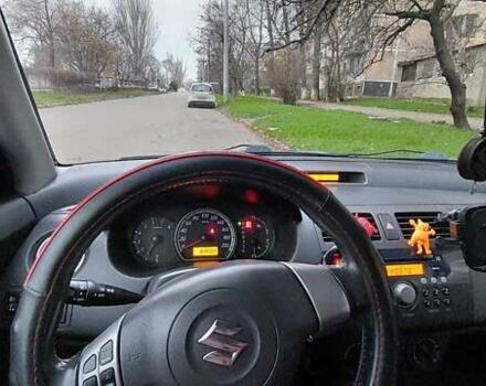 Красный Сузуки Свифт, объемом двигателя 1.49 л и пробегом 168 тыс. км за 7300 $, фото 3 на Automoto.ua