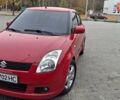 Красный Сузуки Свифт, объемом двигателя 1.49 л и пробегом 218 тыс. км за 6300 $, фото 1 на Automoto.ua