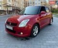 Красный Сузуки Свифт, объемом двигателя 1.49 л и пробегом 200 тыс. км за 6500 $, фото 1 на Automoto.ua