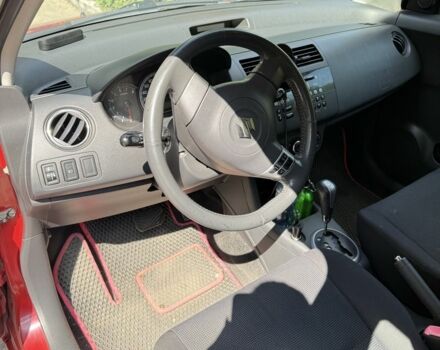 Красный Сузуки Свифт, объемом двигателя 1.5 л и пробегом 255 тыс. км за 5600 $, фото 4 на Automoto.ua