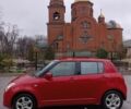 Красный Сузуки Свифт, объемом двигателя 1.5 л и пробегом 320 тыс. км за 5600 $, фото 1 на Automoto.ua