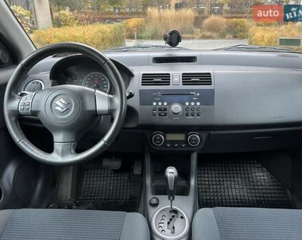 Красный Сузуки Свифт, объемом двигателя 1.49 л и пробегом 169 тыс. км за 6950 $, фото 30 на Automoto.ua