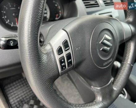 Красный Сузуки Свифт, объемом двигателя 1.49 л и пробегом 169 тыс. км за 6950 $, фото 29 на Automoto.ua