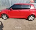 Красный Сузуки Свифт, объемом двигателя 1.5 л и пробегом 235 тыс. км за 6300 $, фото 1 на Automoto.ua