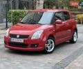 Красный Сузуки Свифт, объемом двигателя 1.49 л и пробегом 169 тыс. км за 6950 $, фото 1 на Automoto.ua