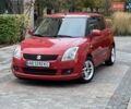 Красный Сузуки Свифт, объемом двигателя 1.49 л и пробегом 169 тыс. км за 6950 $, фото 1 на Automoto.ua