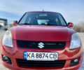 Красный Сузуки Свифт, объемом двигателя 1.33 л и пробегом 164 тыс. км за 5400 $, фото 1 на Automoto.ua