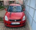 Красный Сузуки Свифт, объемом двигателя 1.2 л и пробегом 183 тыс. км за 4300 $, фото 1 на Automoto.ua