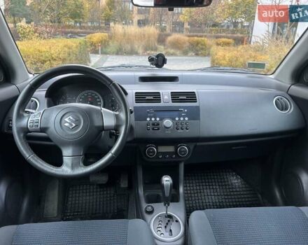 Красный Сузуки Свифт, объемом двигателя 1.49 л и пробегом 169 тыс. км за 6950 $, фото 27 на Automoto.ua
