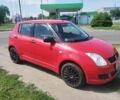 Красный Сузуки Свифт, объемом двигателя 1.3 л и пробегом 162 тыс. км за 3950 $, фото 1 на Automoto.ua