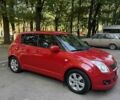 Красный Сузуки Свифт, объемом двигателя 1.3 л и пробегом 231 тыс. км за 5000 $, фото 1 на Automoto.ua