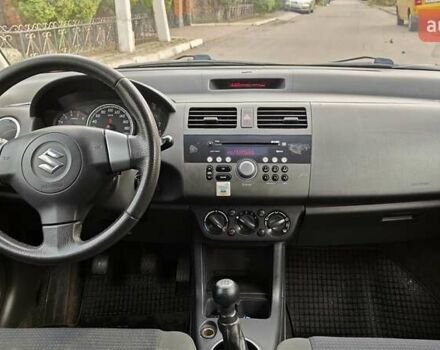 Сузуки Свифт 2010 в Киеве на Automoto.ua Красный Сузуки Свифт, объемом двигателя 1.33 л и пробегом 198 тыс. км за 4100 $, фото 27 на Automoto.ua