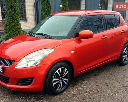 Красный Сузуки Свифт, объемом двигателя 1.24 л и пробегом 235 тыс. км за 6990 $, фото 2 на Automoto.ua