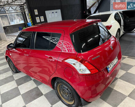 Червоний Сузукі Свифт, об'ємом двигуна 1.24 л та пробігом 140 тис. км за 7500 $, фото 5 на Automoto.ua