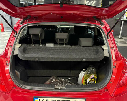 Червоний Сузукі Свифт, об'ємом двигуна 1.24 л та пробігом 140 тис. км за 7500 $, фото 7 на Automoto.ua