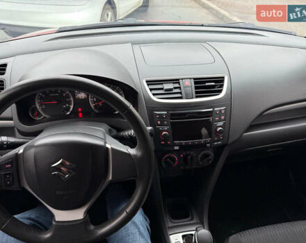 Червоний Сузукі Свифт, об'ємом двигуна 1.24 л та пробігом 140 тис. км за 7500 $, фото 14 на Automoto.ua