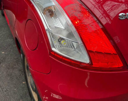 Червоний Сузукі Свифт, об'ємом двигуна 1.24 л та пробігом 140 тис. км за 7500 $, фото 4 на Automoto.ua