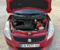 Червоний Сузукі Свифт, об'ємом двигуна 1.24 л та пробігом 145 тис. км за 8500 $, фото 21 на Automoto.ua