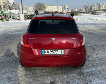 Червоний Сузукі Свифт, об'ємом двигуна 1.24 л та пробігом 145 тис. км за 8500 $, фото 5 на Automoto.ua