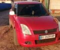 Червоний Сузукі Свифт, об'ємом двигуна 1.3 л та пробігом 265 тис. км за 5500 $, фото 1 на Automoto.ua