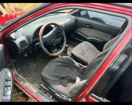 Красный Сузуки Свифт, объемом двигателя 1.6 л и пробегом 250 тыс. км за 709 $, фото 3 на Automoto.ua