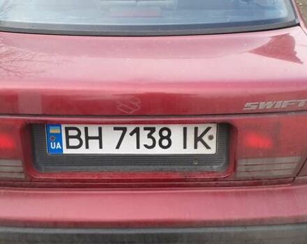 Красный Сузуки Свифт, объемом двигателя 1.3 л и пробегом 81 тыс. км за 1100 $, фото 2 на Automoto.ua