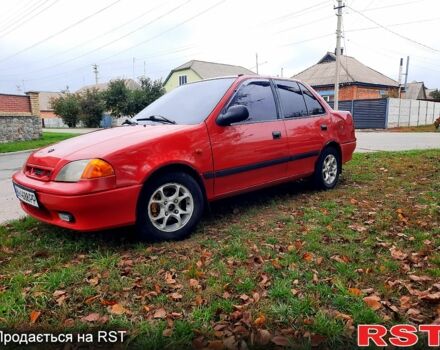 Красный Сузуки Свифт, объемом двигателя 1.3 л и пробегом 280 тыс. км за 1700 $, фото 1 на Automoto.ua