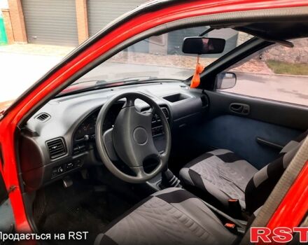 Красный Сузуки Свифт, объемом двигателя 1.3 л и пробегом 280 тыс. км за 1700 $, фото 4 на Automoto.ua