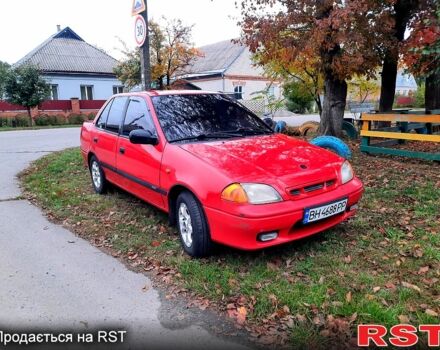 Красный Сузуки Свифт, объемом двигателя 1.3 л и пробегом 280 тыс. км за 1700 $, фото 3 на Automoto.ua