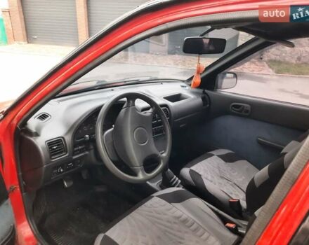 Червоний Сузукі Свифт, об'ємом двигуна 1.3 л та пробігом 280 тис. км за 1700 $, фото 11 на Automoto.ua
