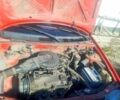 Красный Сузуки Свифт, объемом двигателя 1.3 л и пробегом 280 тыс. км за 1700 $, фото 1 на Automoto.ua