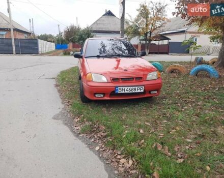 Червоний Сузукі Свифт, об'ємом двигуна 1.3 л та пробігом 280 тис. км за 1700 $, фото 3 на Automoto.ua