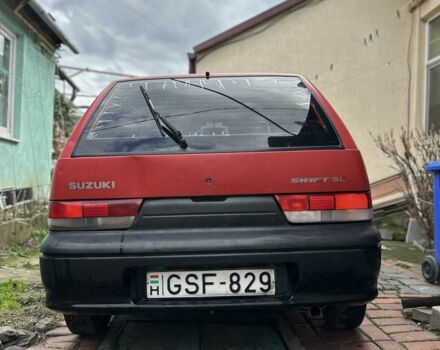 Красный Сузуки Свифт, объемом двигателя 1 л и пробегом 155 тыс. км за 750 $, фото 1 на Automoto.ua