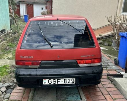 Красный Сузуки Свифт, объемом двигателя 1 л и пробегом 155 тыс. км за 750 $, фото 5 на Automoto.ua