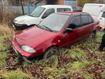 Красный Сузуки Свифт, объемом двигателя 1.6 л и пробегом 250 тыс. км за 709 $, фото 1 на Automoto.ua