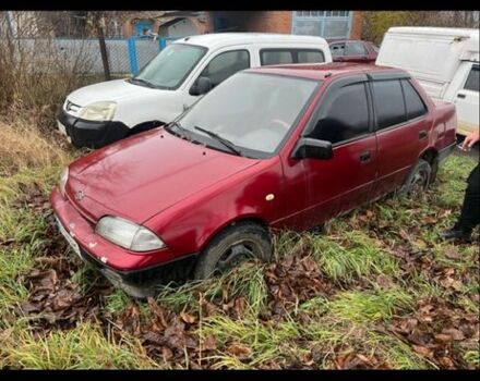 Красный Сузуки Свифт, объемом двигателя 1.6 л и пробегом 250 тыс. км за 709 $, фото 1 на Automoto.ua