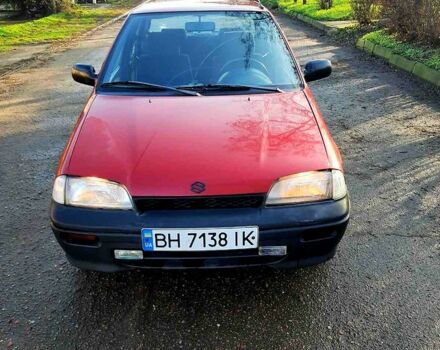 Красный Сузуки Свифт, объемом двигателя 1.3 л и пробегом 225 тыс. км за 1300 $, фото 1 на Automoto.ua