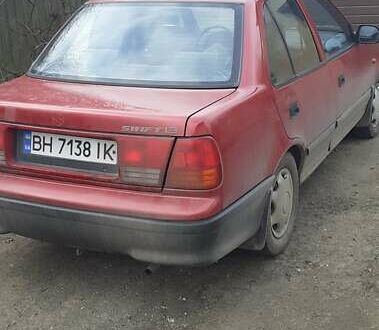 Красный Сузуки Свифт, объемом двигателя 1.3 л и пробегом 81 тыс. км за 1100 $, фото 1 на Automoto.ua