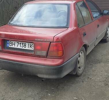 Красный Сузуки Свифт, объемом двигателя 1.3 л и пробегом 81 тыс. км за 1100 $, фото 1 на Automoto.ua