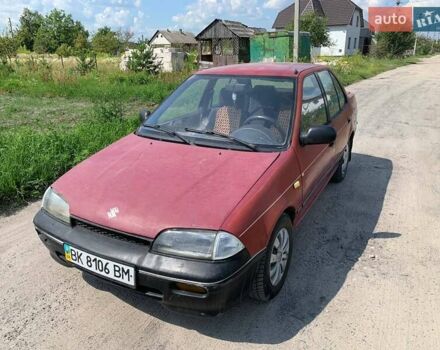 Красный Сузуки Свифт, объемом двигателя 1.3 л и пробегом 550 тыс. км за 790 $, фото 1 на Automoto.ua