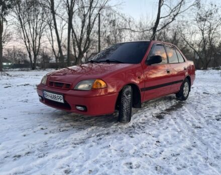 Червоний Сузукі Свифт, об'ємом двигуна 1.3 л та пробігом 28 тис. км за 1900 $, фото 1 на Automoto.ua
