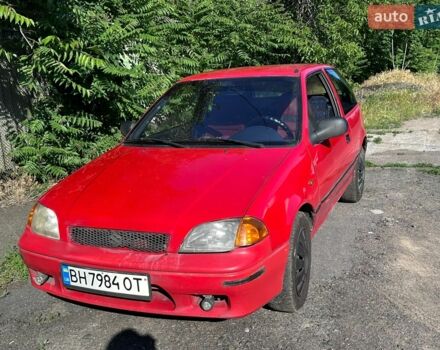 Красный Сузуки Свифт, объемом двигателя 0.99 л и пробегом 390 тыс. км за 1900 $, фото 1 на Automoto.ua