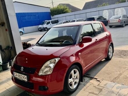 Красный Сузуки Свифт, объемом двигателя 1.3 л и пробегом 210 тыс. км за 5200 $, фото 1 на Automoto.ua