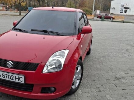 Червоний Сузукі Свифт, об'ємом двигуна 1.3 л та пробігом 217 тис. км за 5600 $, фото 1 на Automoto.ua