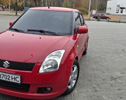 Червоний Сузукі Свифт, об'ємом двигуна 1.3 л та пробігом 217 тис. км за 5600 $, фото 1 на Automoto.ua