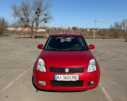 Червоний Сузукі Свифт, об'ємом двигуна 1.33 л та пробігом 245 тис. км за 5400 $, фото 1 на Automoto.ua