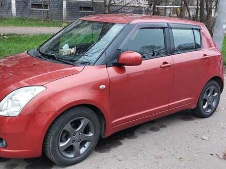 Красный Сузуки Свифт, объемом двигателя 1.49 л и пробегом 168 тыс. км за 7300 $, фото 1 на Automoto.ua